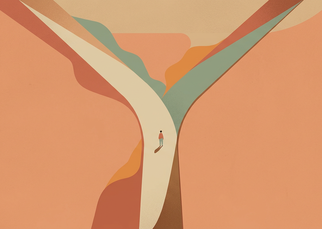 Overhead of two roads splitting with a small figure at the fork